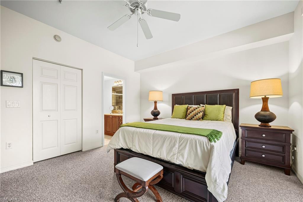 Bedroom featuring neutral-toned carpeting and light-colored walls