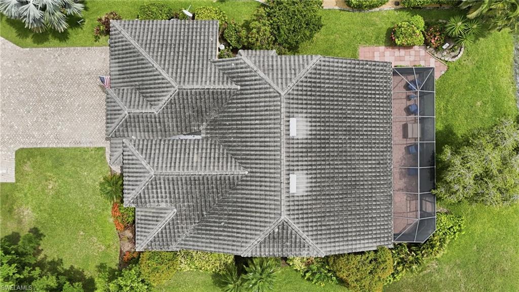 Tile roof with multiple gables and skylights