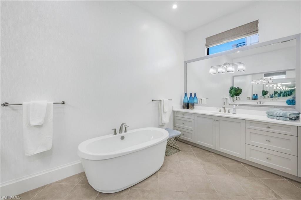 Primary soaking tub 1 of 2 vanities