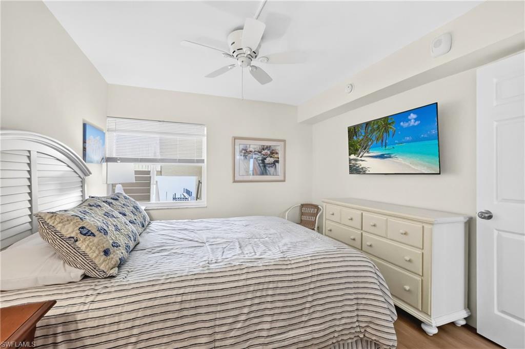 Guest Bedroom with Queen Bed and TV
