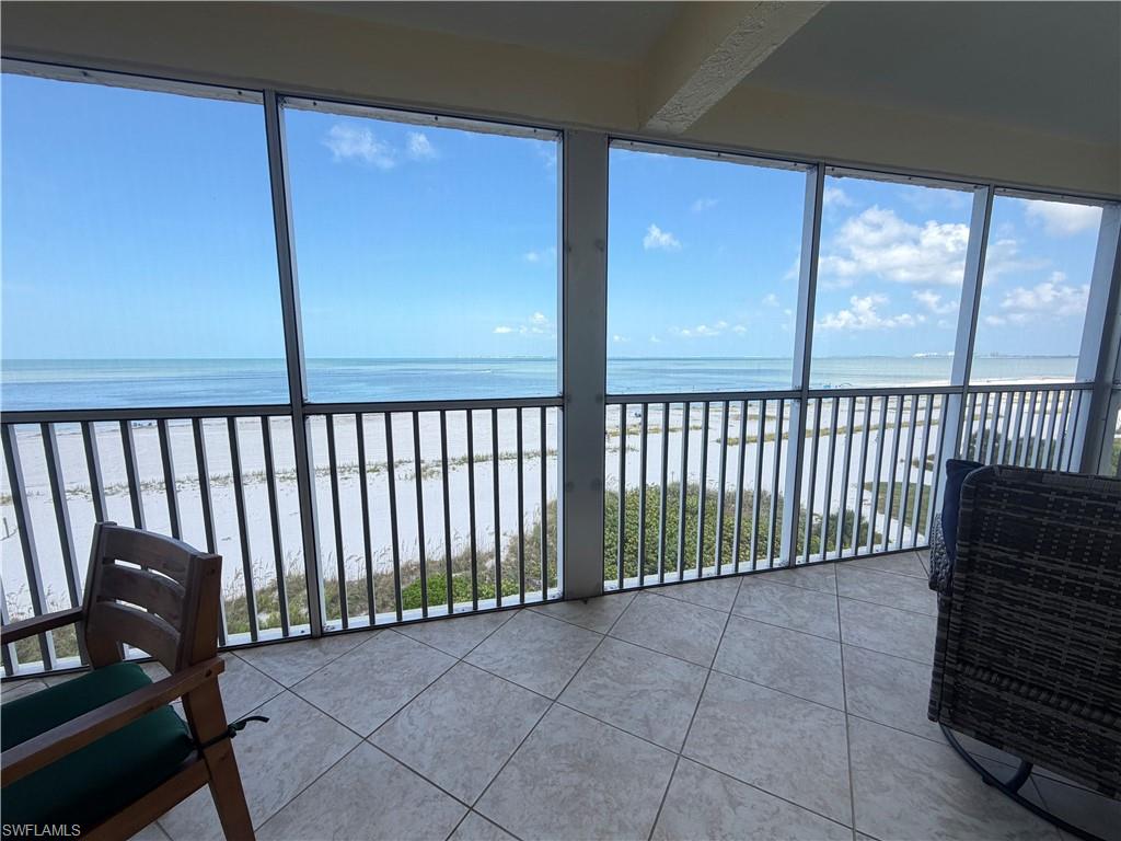 Screened Lanai with a beautiful beach view.