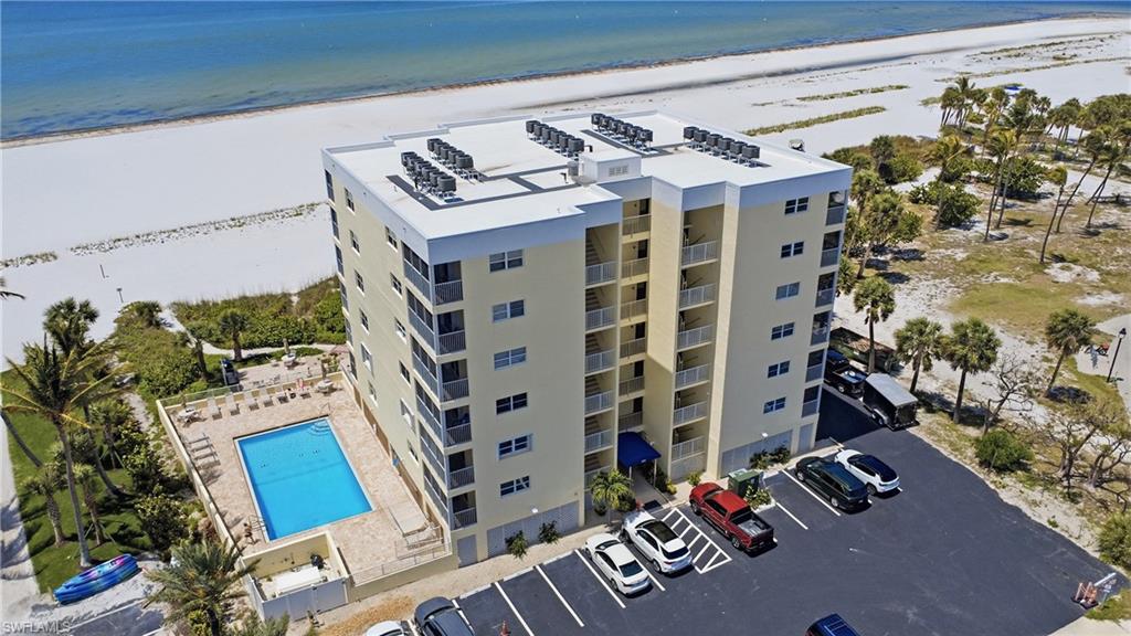100 Estero Blvd. #433 with Community Pool and Beautiful White Sugar Sand Beach