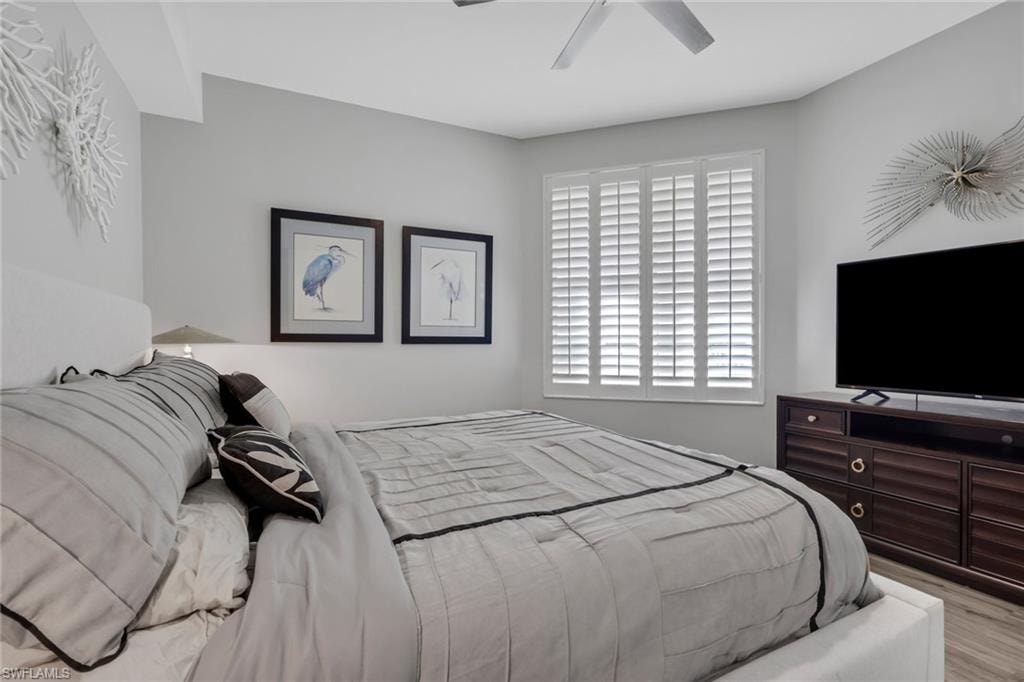 Bedroom featuring a ceiling fan and light wood finished floors