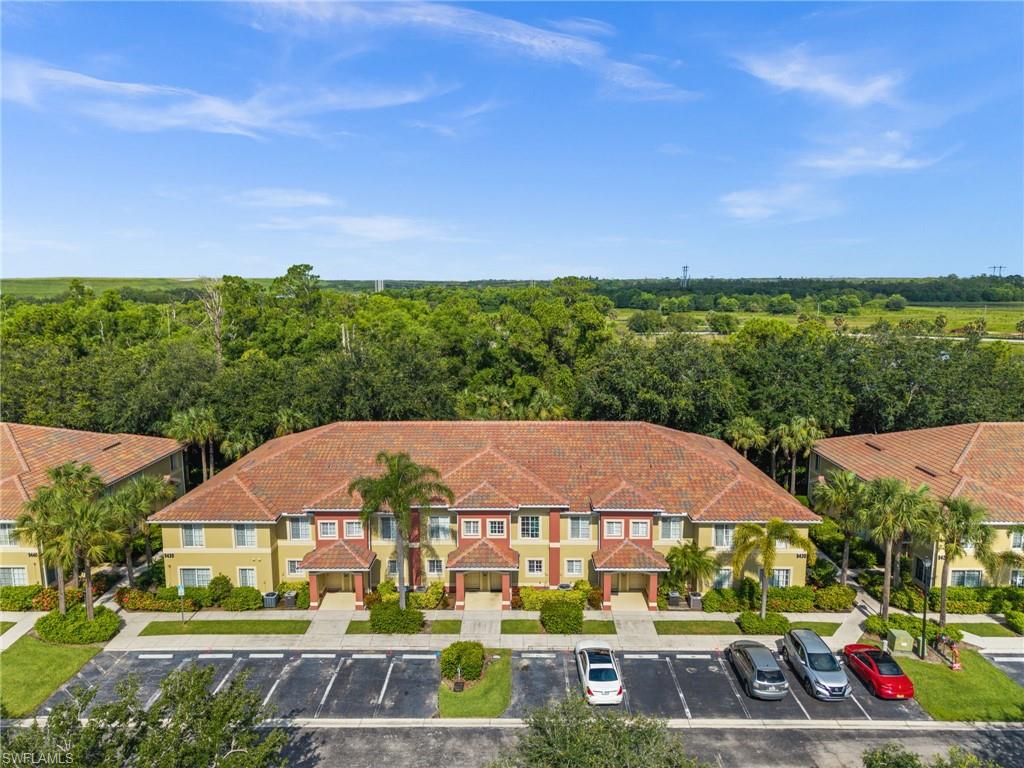 Mediterranean-inspired architecture featuring terracotta-style roofing and stucco siding
