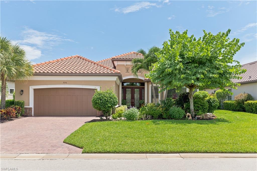 Mediterranean-inspired exterior with a terracotta tile roof