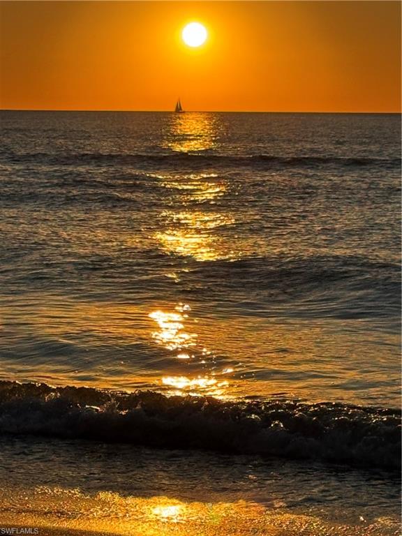 View of beach at sunset