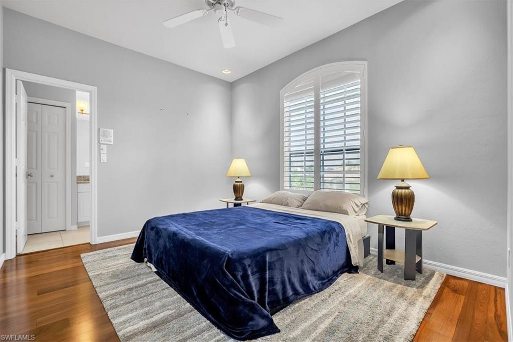 Interior room featuring wood-finish flooring and light gray wall color