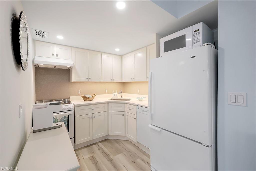 Kitchen featuring brand new cabinetry and appliances.