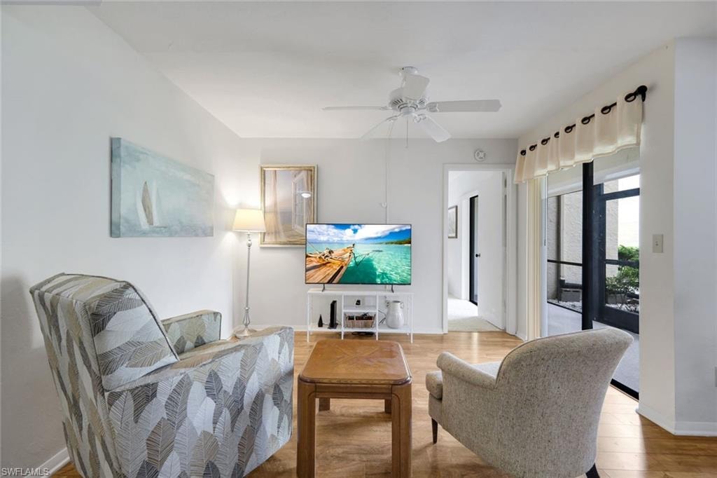 Notice the upgraded wood-look flooring throughout the main living area.