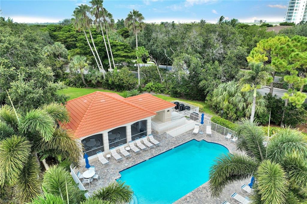 The Hamptons community pool is located directly across the street from this home!