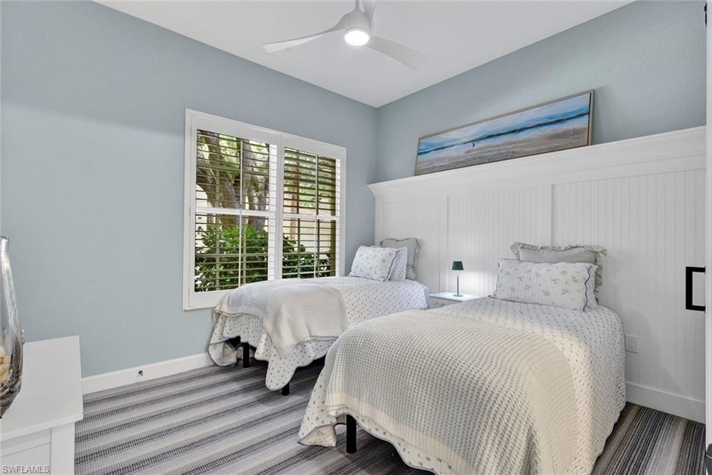 Guest bedroom features brand new carpeting and so many small details that are sure to wow guests.