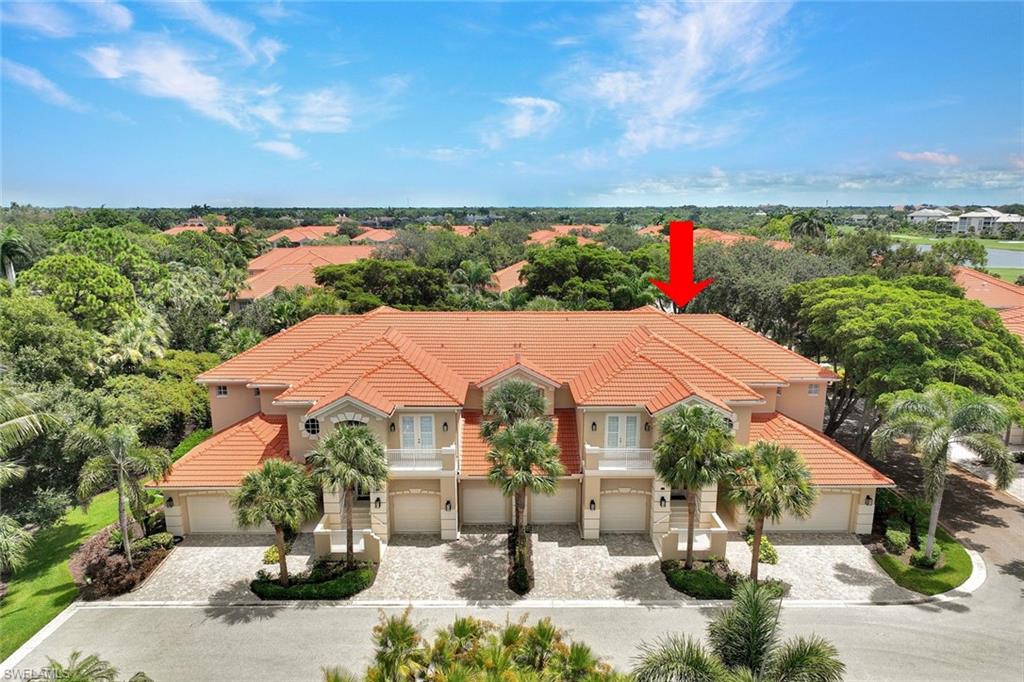 Welcome home to this first floor end unit just steps away from the pool!