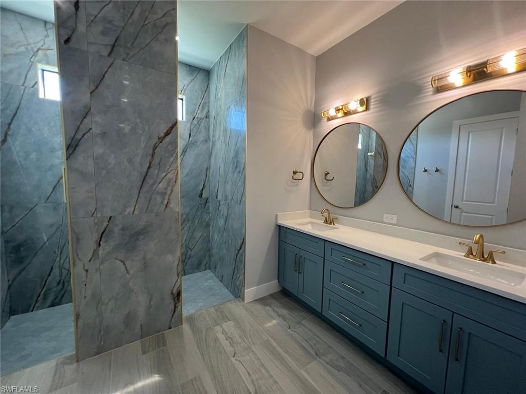 Bathroom view of a marble finish shower