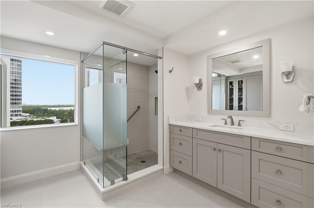 Expansive double vanity with exceptional counter and storage space.