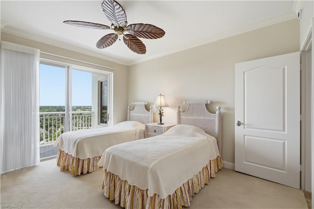 Guest bedroom with its own access to the lanai and a nice open view.