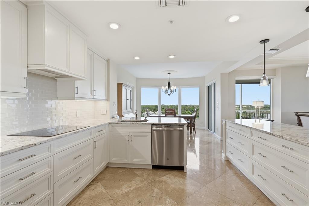 Beautifully updated kitchen with generous counter space, ample cabinetry, and a functional layout.