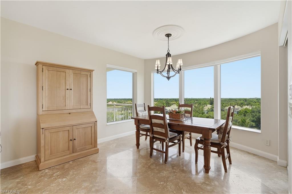 Light-filled dining area with wide-open views and a warm, inviting feel.