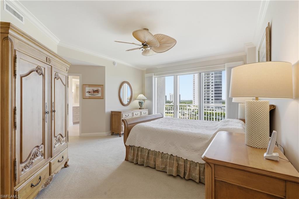 Spacious primary bedroom with room for substantial furnishings and natural light.