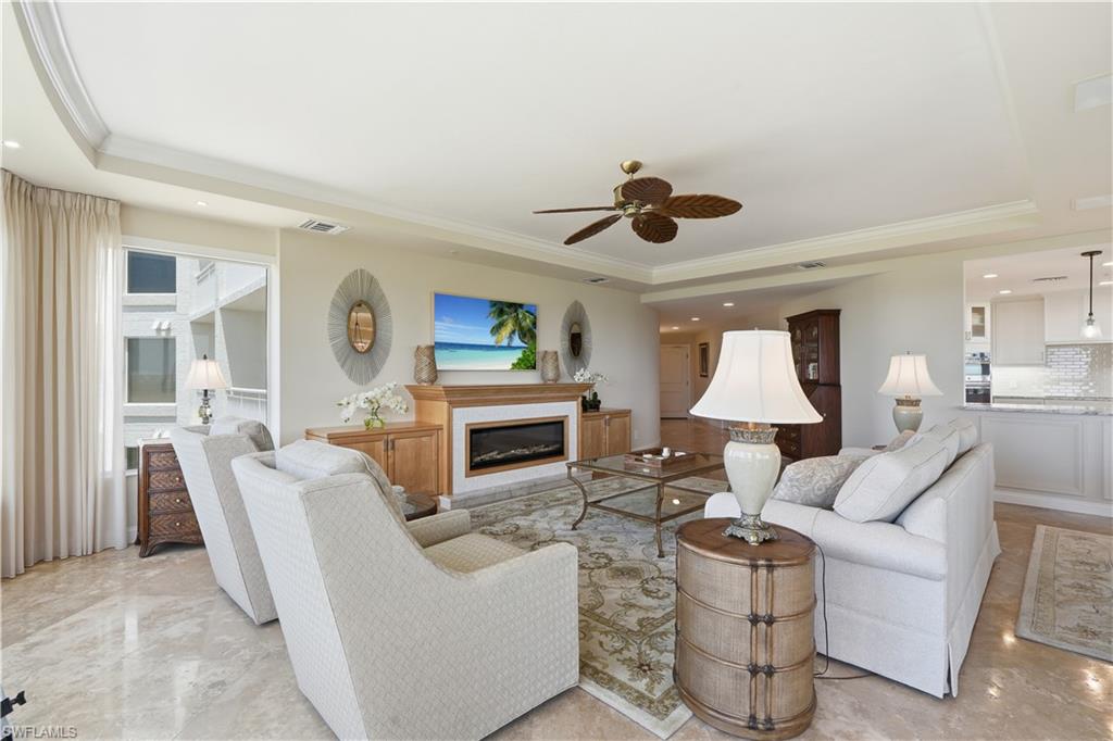Inviting living room featuring abundant natural light and beautiful views.