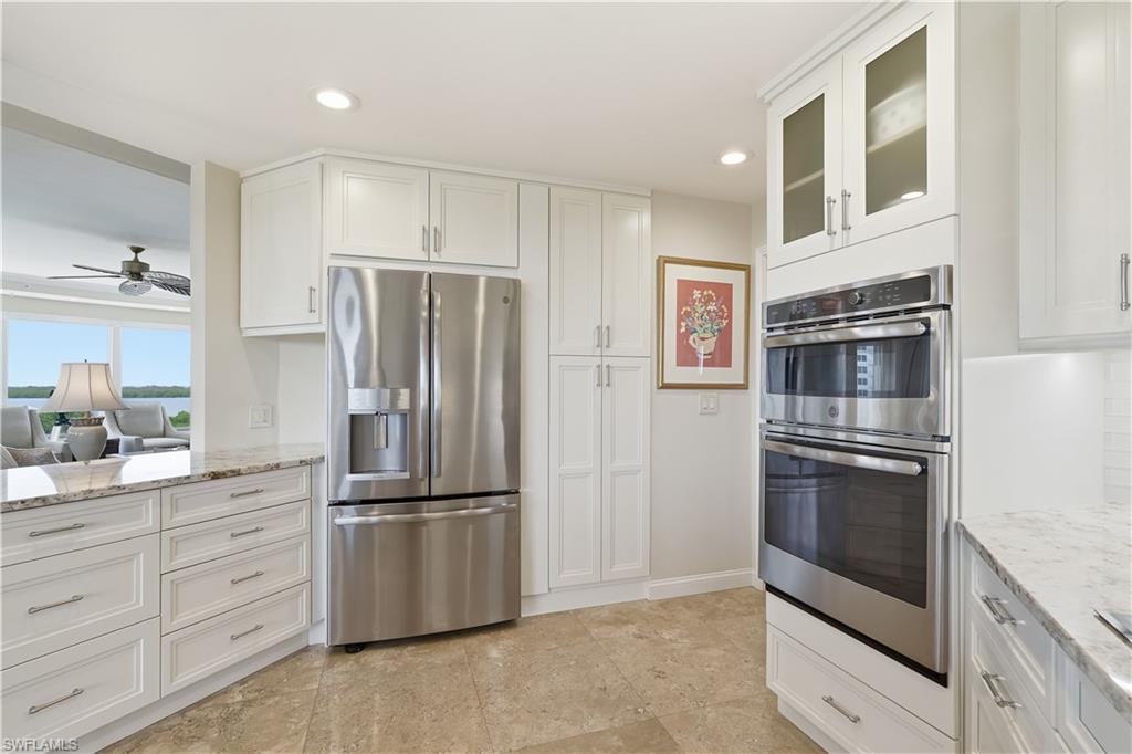 Stainless steel appliances, double wall ovens, and convenient, pull out drawers.