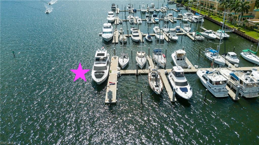 Aerial view of a nearby body of water and a marina