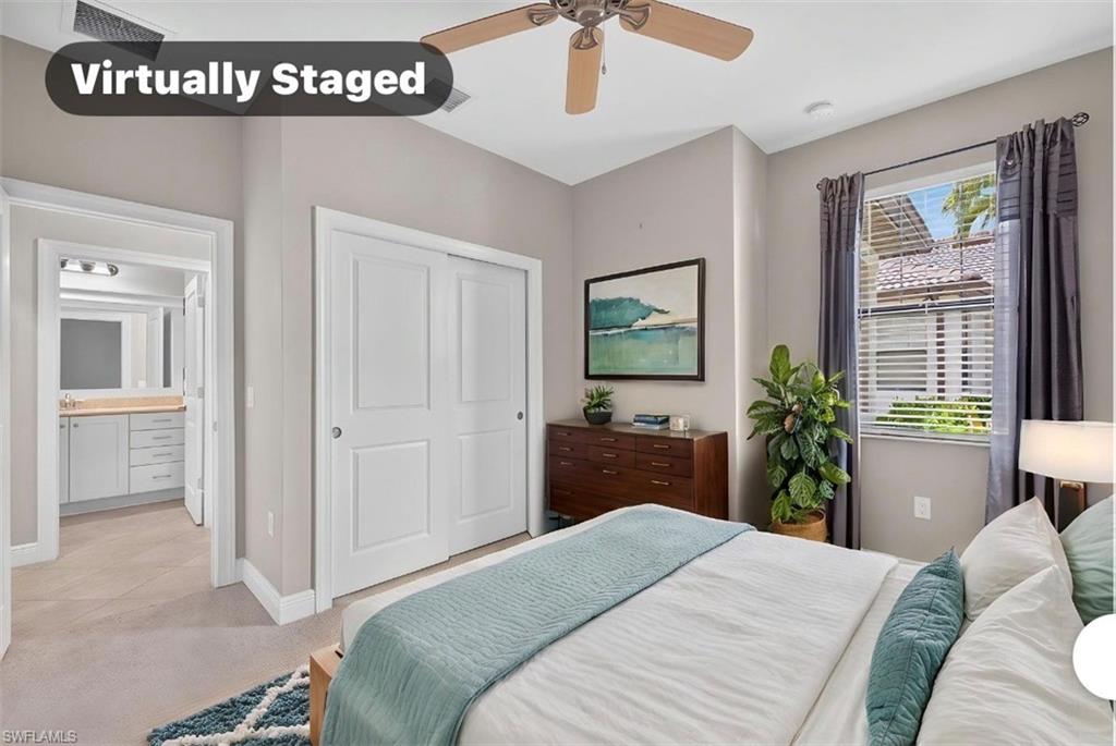 Bedroom featuring neutral wall colors, a ceiling fan, a window with blinds, drapes and a closet