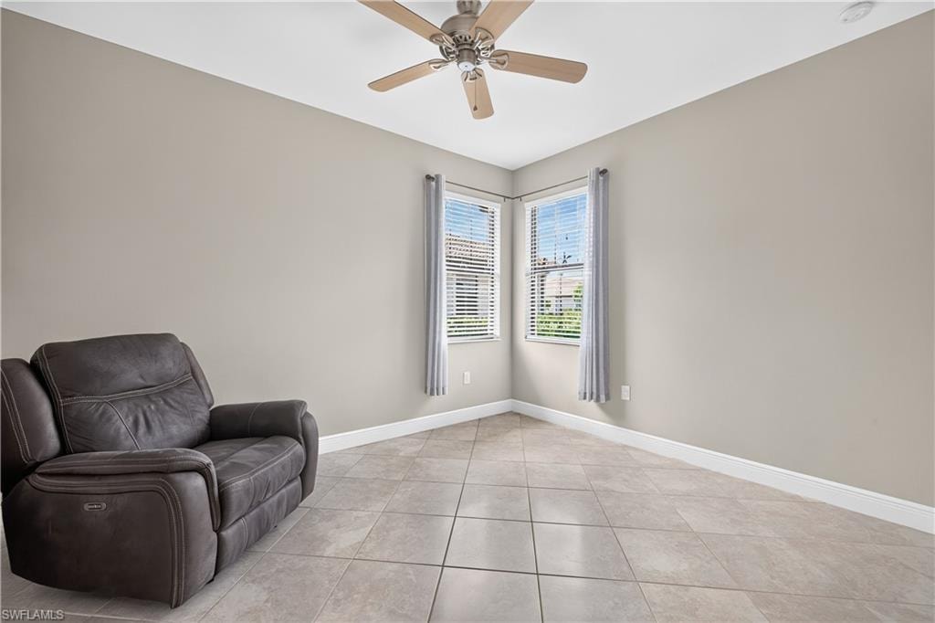 French doors lead into the large den that can be used as an office and/or a third bedroom.