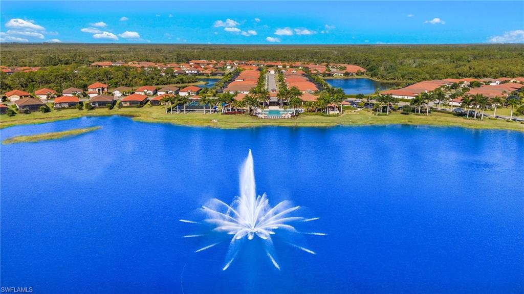 Expansive lake featuring a decorative fountain