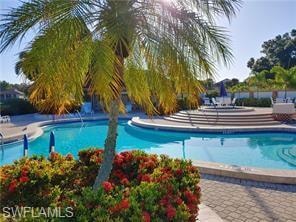 Resort-style pool with integrated spa and tiered deck