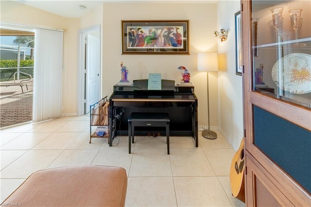 Sitting room featuring light tile patterned floors
