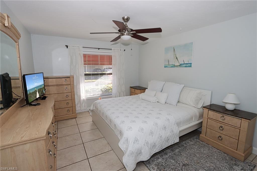Bedroom featuring ceiling fan and light tile patterned floors