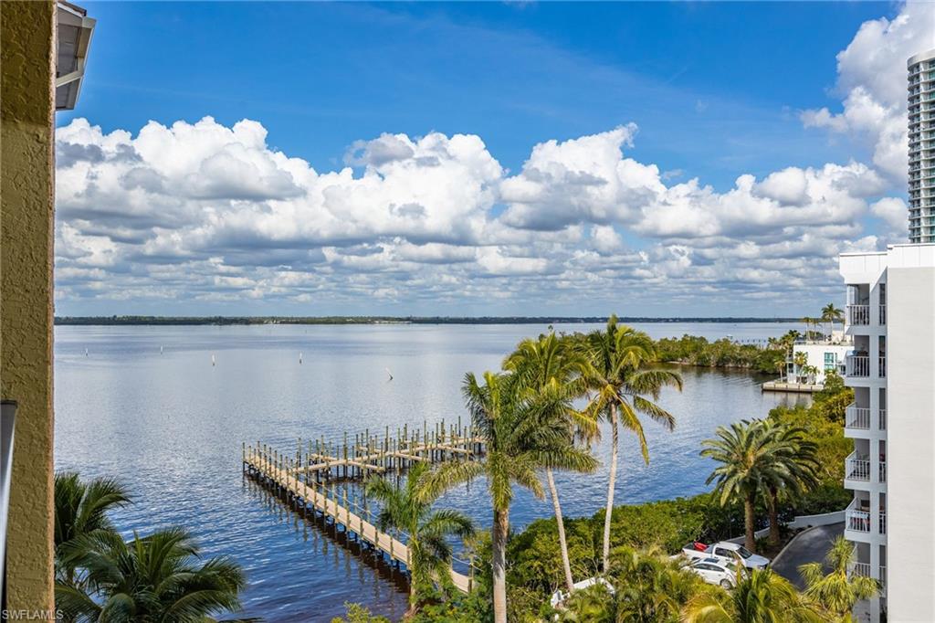 Water view with a boat dock