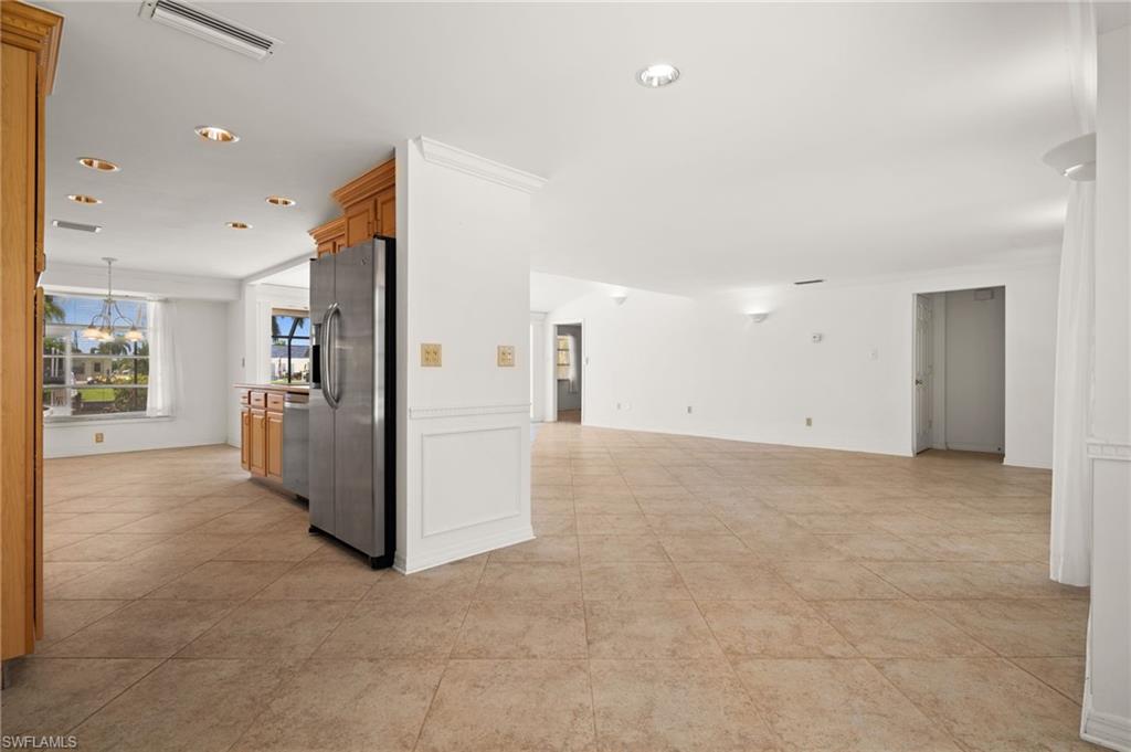View from the breakfast room into the kitchen and living room