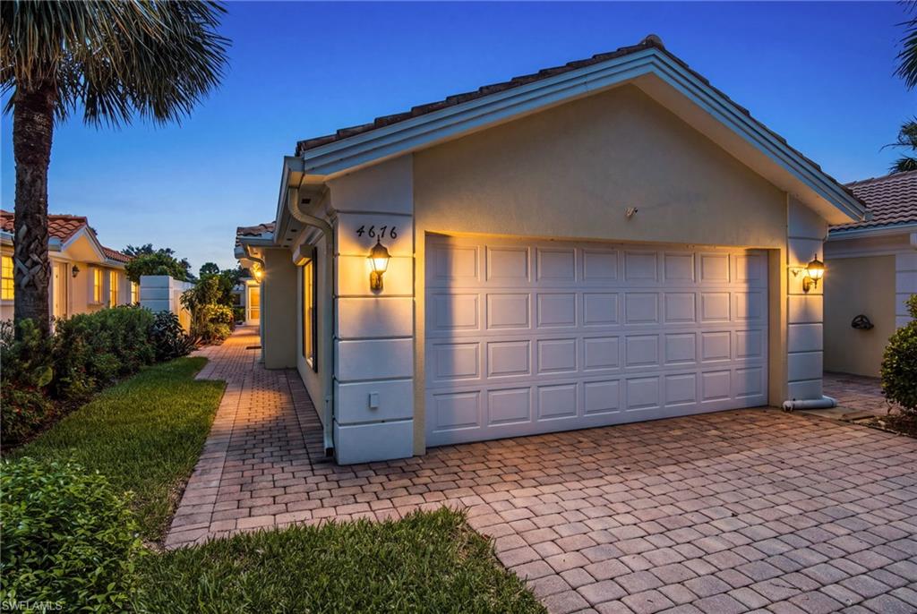 NEW ROOF (2019), NEW A/C (2023), updated WOOD-LOOK FLOORING in both bedrooms, neutral tile throughout the main living areas, NO CARPET and STORM PROTECTION FOR ALL WINDOWS.