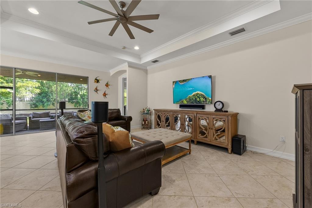 Living area with neutral wall tones and large format tile flooring