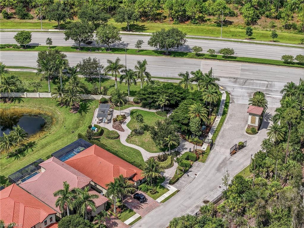 Aerial perspective of gate entrance featuring the community park overlooking a lake