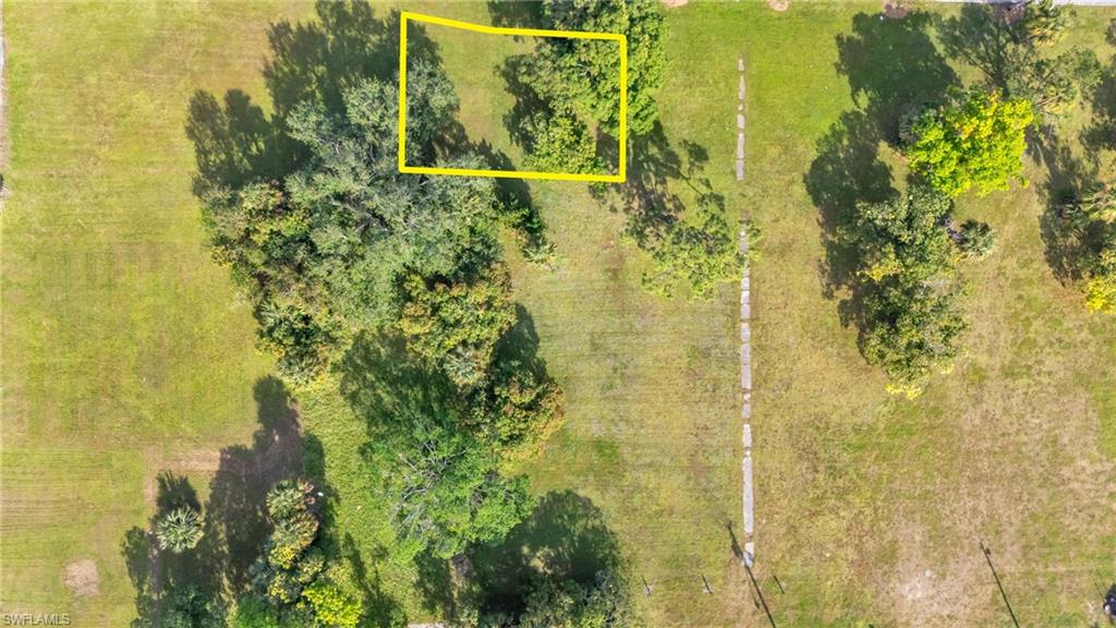 Aerial overview of property's location featuring property parcel outlined