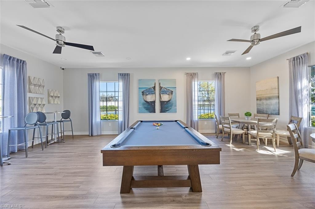 Rec room with ceiling fan, billiards table, light wood-style flooring, and recessed lighting