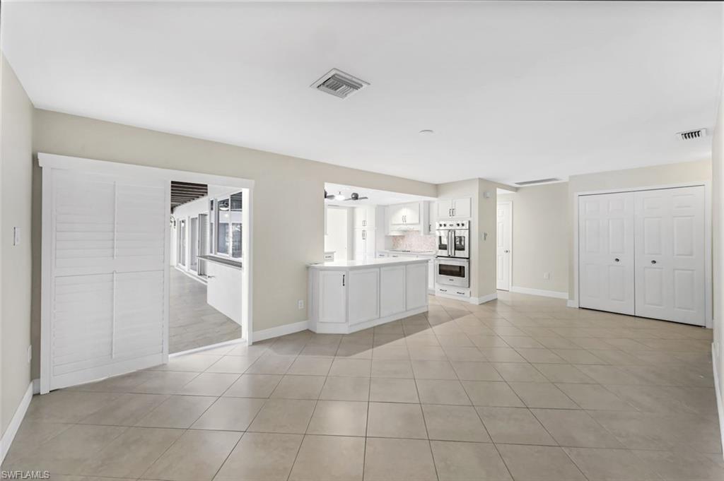 Dining Area with Sliders to Pool/Lanai area