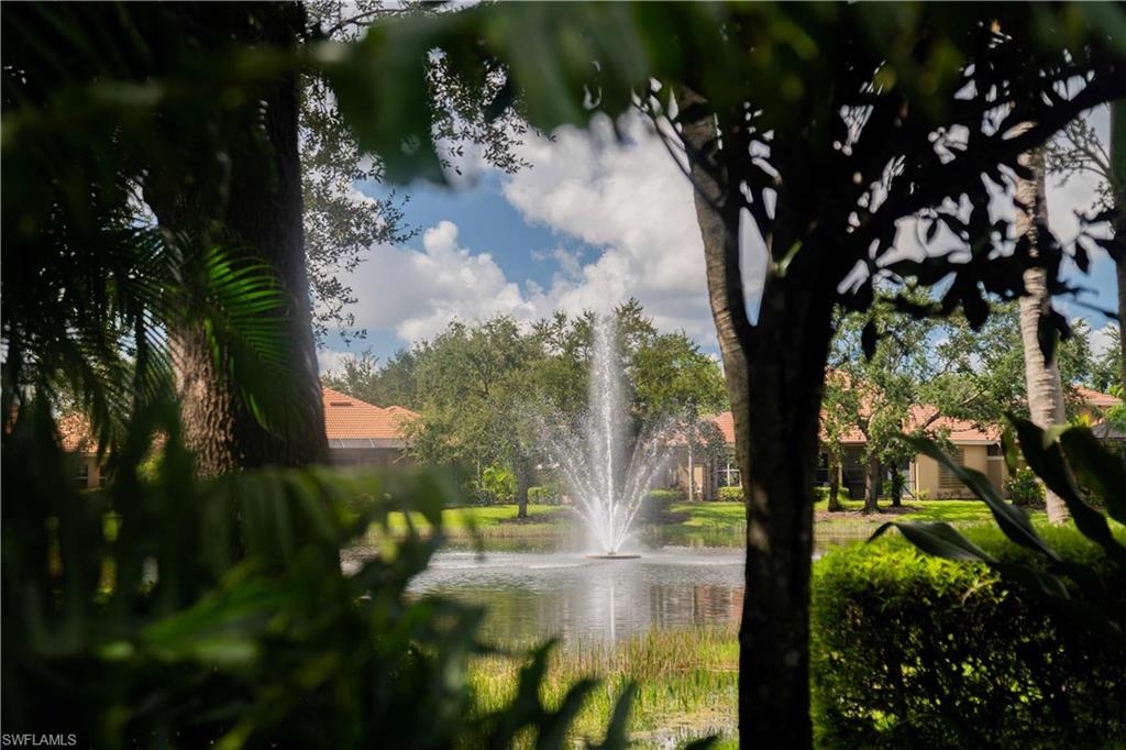View of community featuring a water view
