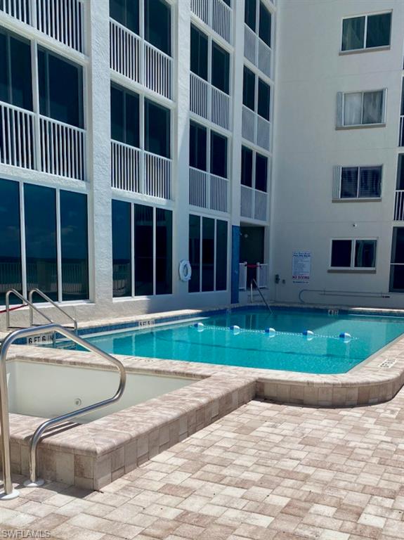 View of swimming pool with a patio