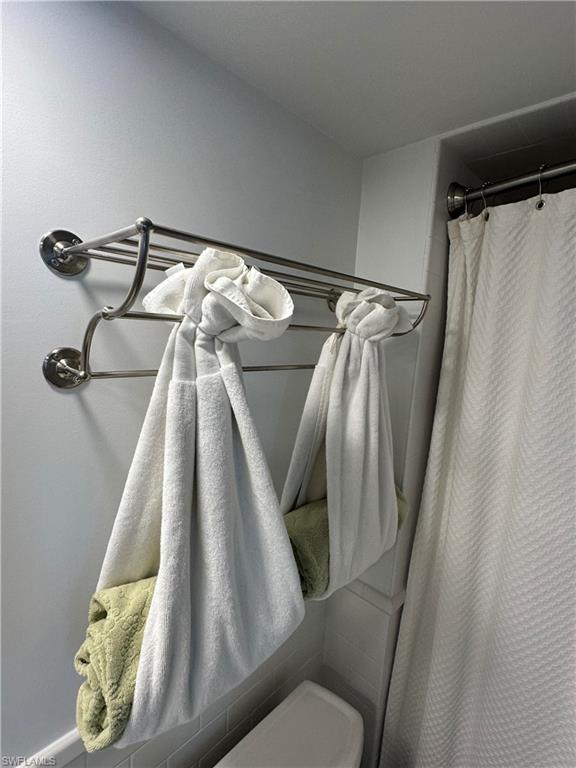 Bathroom with a shower with curtain