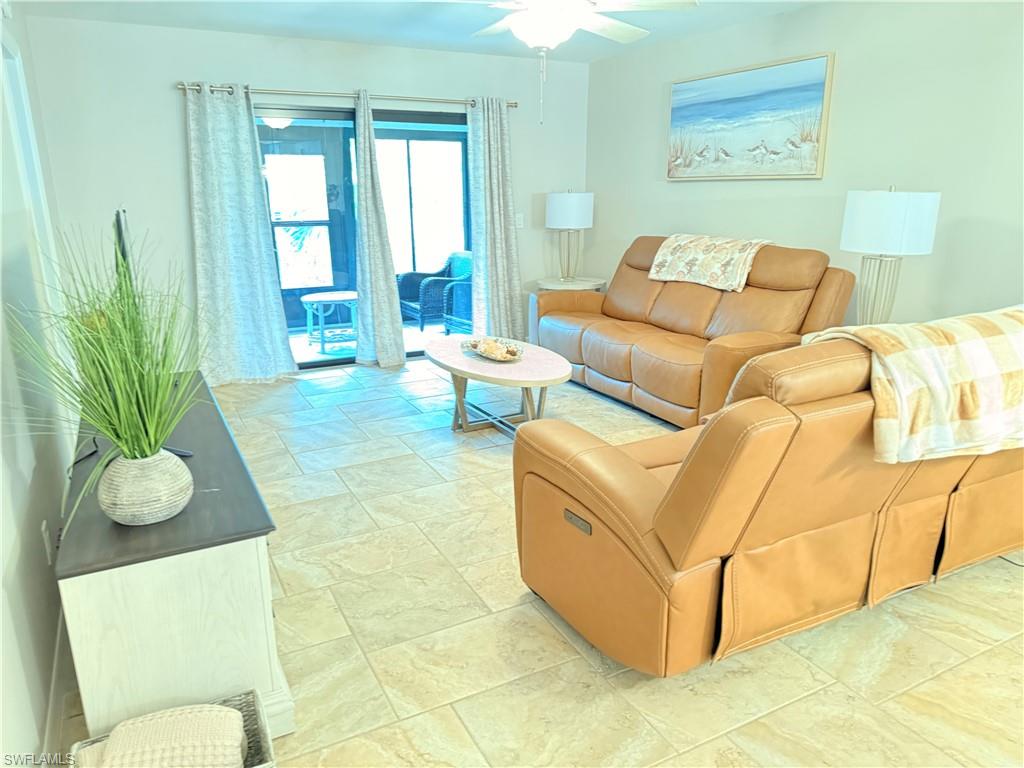 Neutral-toned tile flooring throughout the living space