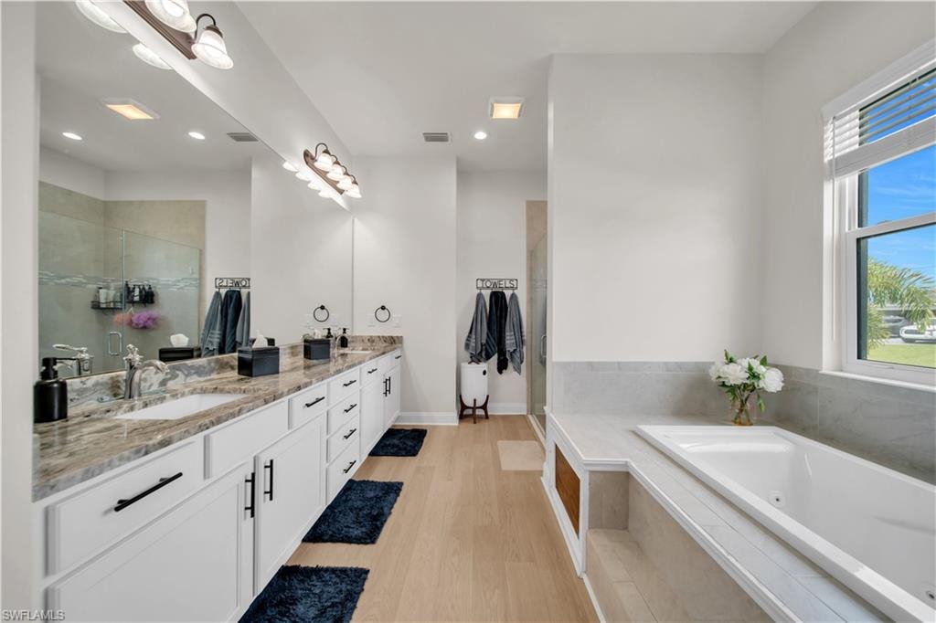 (Master Bathroom)Dual vanity with integrated sinks and extensive countertop space