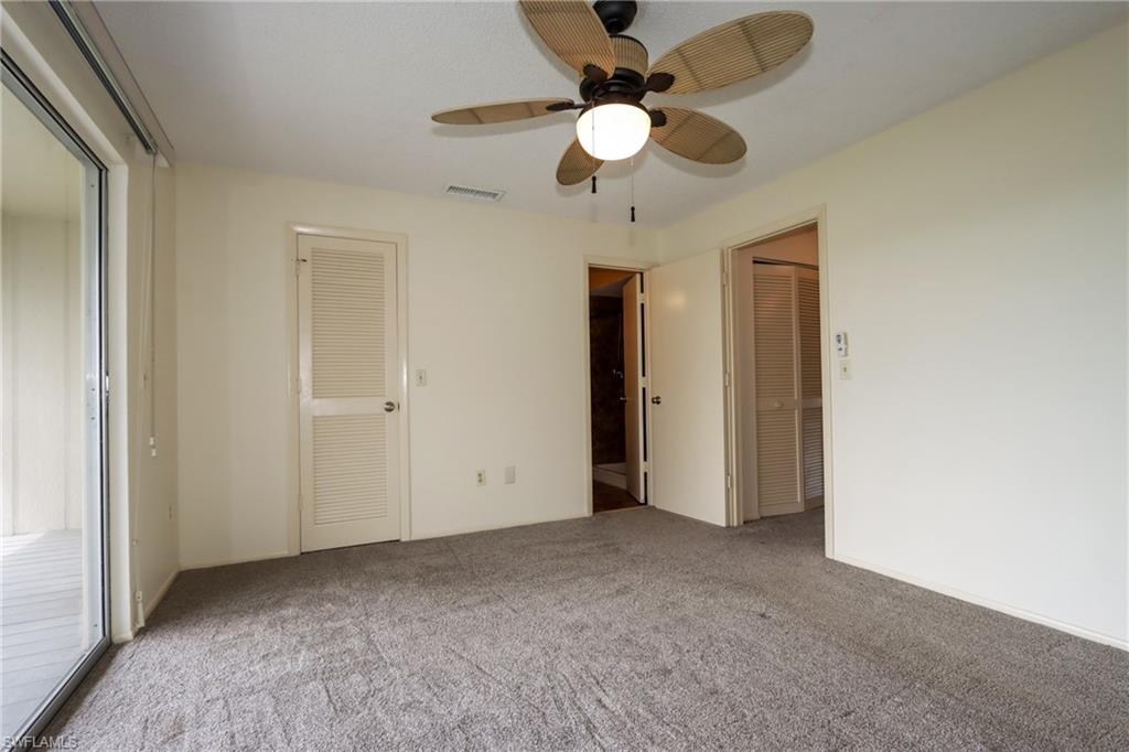 Unfurnished bedroom with carpet floors, ceiling fan, and access to outside