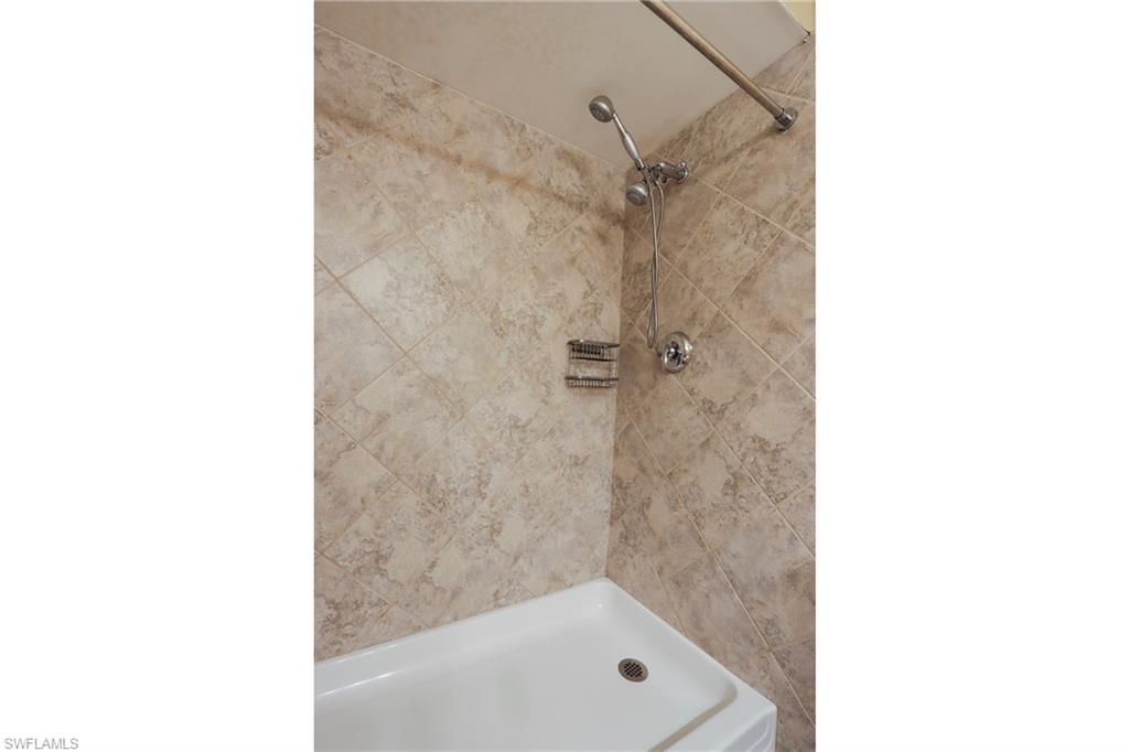 Bathroom with tiled shower