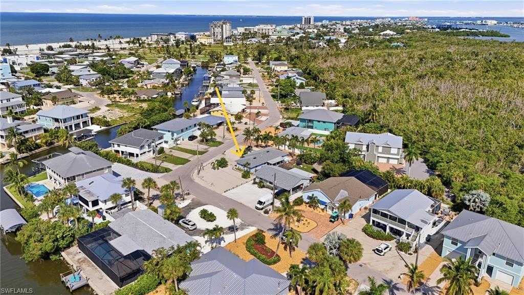 Aerial perspective showcasing the home and walking distance to the BEACH!! YAY!!
