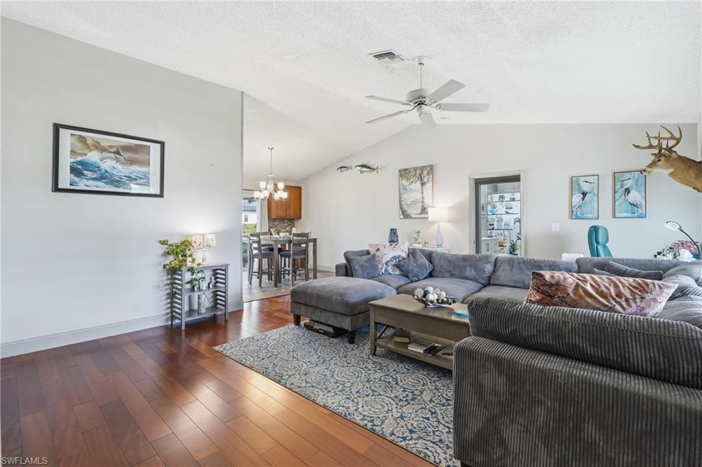 Engineered laminate floors shine throughout the main area
