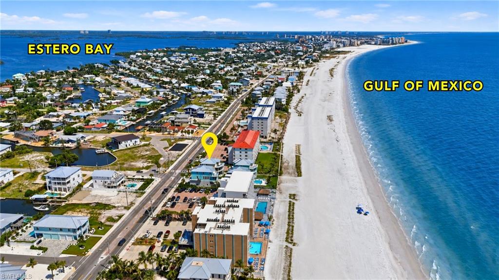 Aerial perspective of the property's proximity to Estero Bay and the Gulf of Mexico - Virtually Edited Image