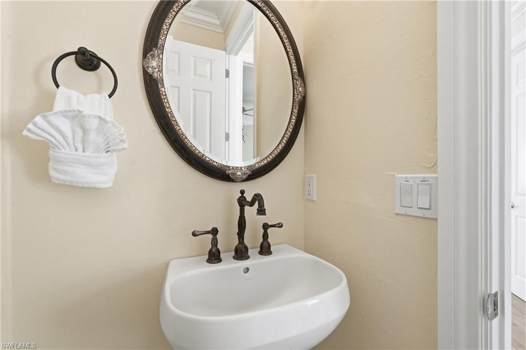 Pedestal sink with oil-rubbed bronze faucet - Virtually Edited Image